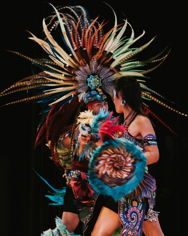 Dominique Salinas (Jicarilla Apache/Navajo) and Marcos Arellano Martinez (Mexivo, Otomi) performing a Deer Dance.